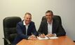 Colin Partington, CEO of LCR Group, signing the mining and haulage contract with Simon Slesarewich, CEO of Metallica
