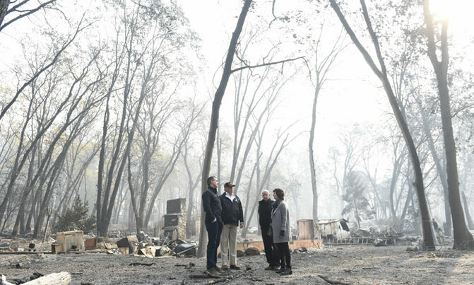 'Sad' Trump visits fire-wracked California, blames mismanagement 'Sad' Trump visits fire-wracked California, blames mismanagement
