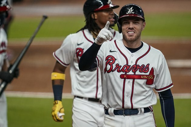 Powerful Braves host underdog Reds in playoff opener