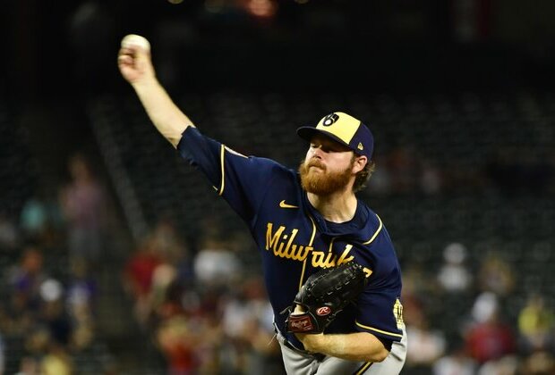 Brandon Woodruff lifts Brewers to series win over D-backs