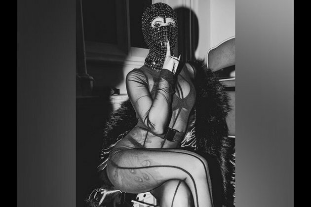Cardi B wears see-through catsuit and ski mask for Paris Fashion Week