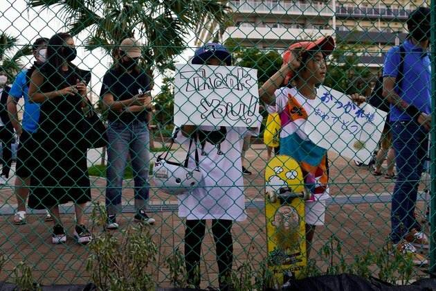 Sneaking a Peek: Fans Find Creative Ways to Glimpse Olympics