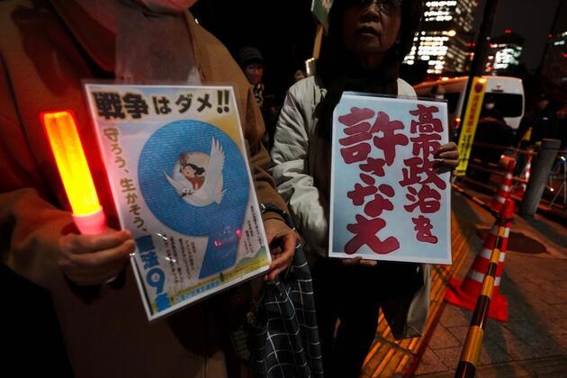 Column: What is Japan hiding under its masks?