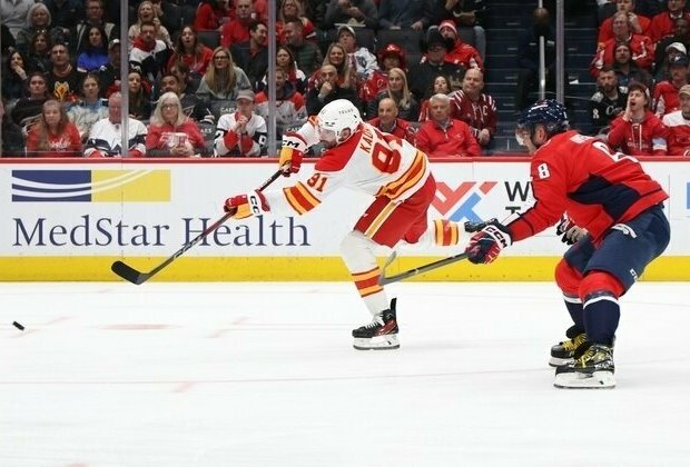 Flames score early, tame surging Capitals