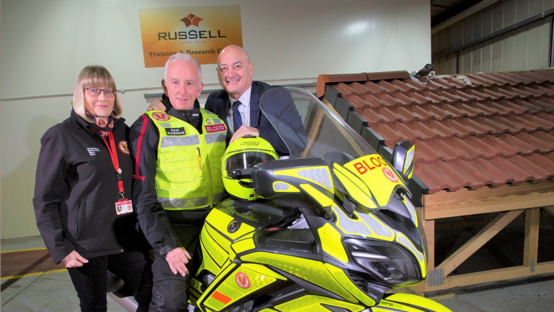  Helen Bundy, Chair of SSBB, Paul Goldsmith, SSBB volunteer, and Andrew Hayward, Managing Director of Russell Roof Tiles