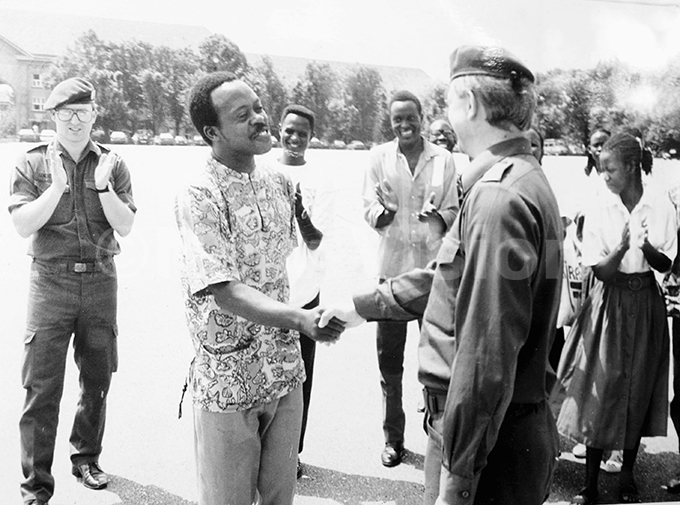 tephen wangyezi shakes hand with rmy officer in   in 1992 after his performance