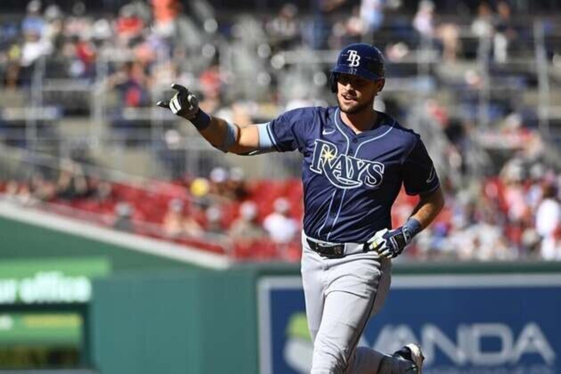 OF Josh Lowe to Angels in three-team, four-player trade