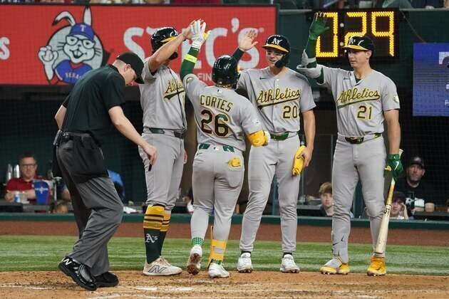Athletics' 5 home runs bury Rangers