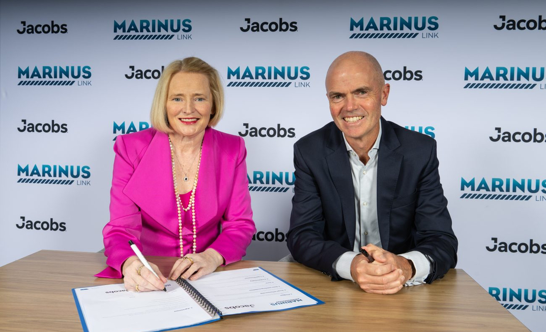 Collette Burke, interim CEO of Marinus Link and Patrick Hill, president Global Operations at Jacobs sign the new agreement.