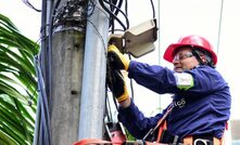  A TigoUne engineer working on overhead cables