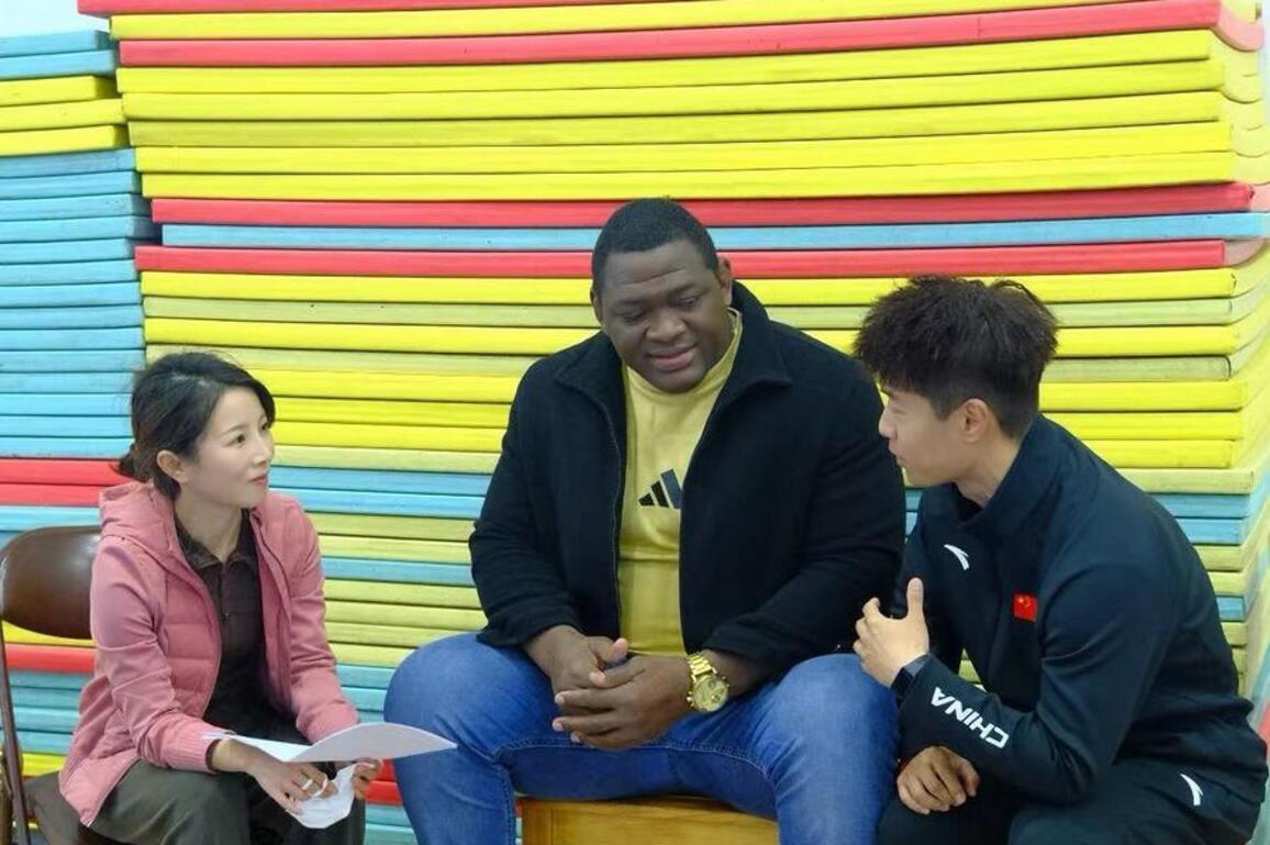 Sports Focus: Cuban wrestling legend and his star pupil's Beijing homecoming