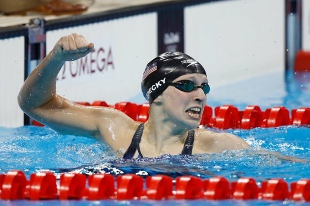 Ledecky edges Titmus in 400 free heats as Olympic records tumble