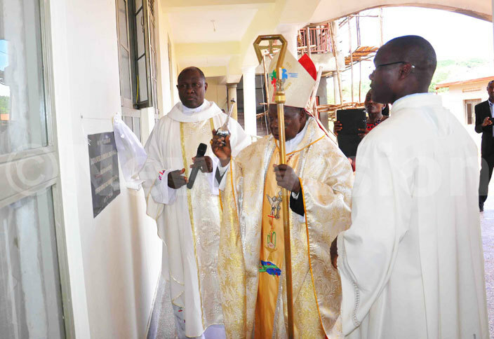  rchbishop meritus of ampala rchdiocese r mmanuel ardinal amala commissions a three storey building at t ndrews ollege