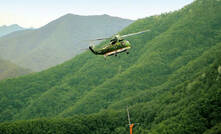 Flying over from the Philippines: a helicopter in the region of the Gubong gold mine
