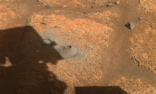  An image taken by one the hazard cameras aboard NASA’s Perseverance showing the hole drilled in what the rover’s science team calls a “paver rock” in preparation for the mission’s first attempt to collect a sample from Mars