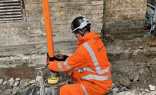  Installing an inclinometer into a pile to check for movement during secant wall excavation