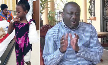 Omwana mu ddwaaliro ne maama. Ku ddyo ye taata Nyombi Thembo Omwana mu ddwaaliro ne maama. Ku ddyo ye taata Nyombi Thembo