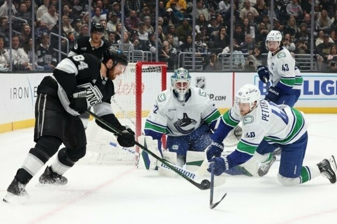 Conor Garland sends Canucks to OT win over Kings