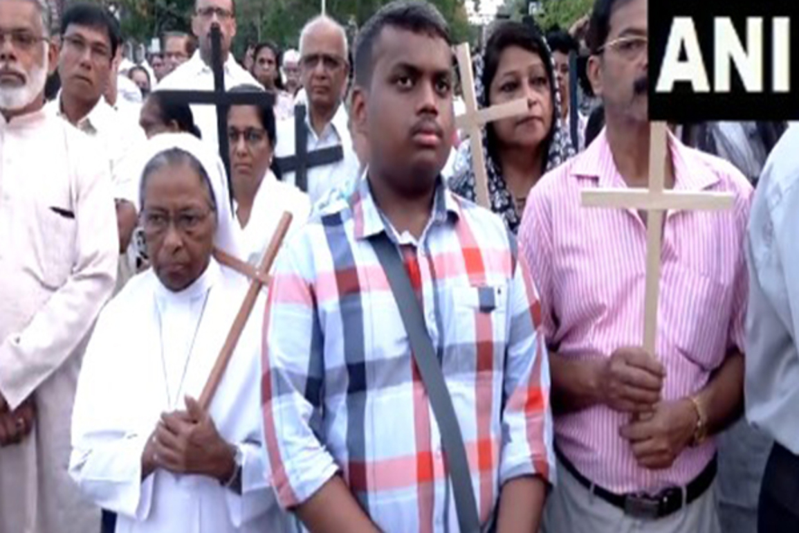 Kerala: Devotees take part in St Joseph's Metropolitan Cathedral's Good Friday procession in Palayam