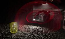 An illustration of a mine worker being detected by a mine truck’s collision-avoidance system.