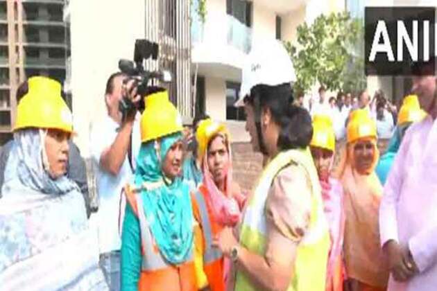 Delhi CM Rekha Gupta interacts with women workers on Labour Day