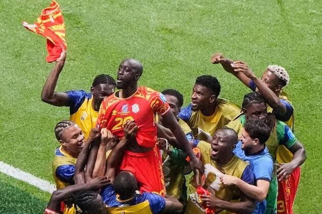 Congo rally to beat Uzbekistan and secure progression