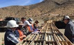 Technical team inspecting core at the Cortadera project