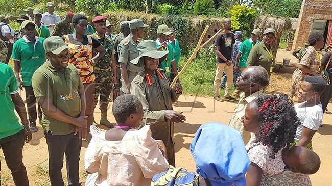 resident useveni greeting the elderly along the way