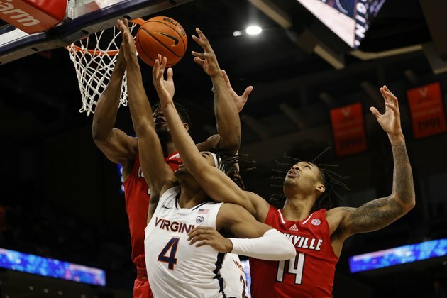Virginia jumps on Louisville, cruises to 64-52 win