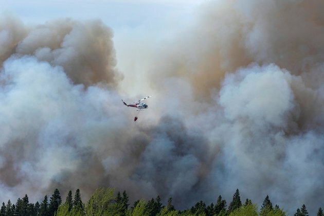Doctor diagnoses elderly woman with a case of CLIMATE CHANGE