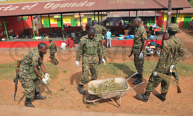 Tarehe Sita: UPDF soldiers clean Namawojjolo Market Tarehe Sita: UPDF soldiers clean Namawojjolo Market