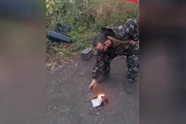 Man fighting for Russia burns his UK passport 
