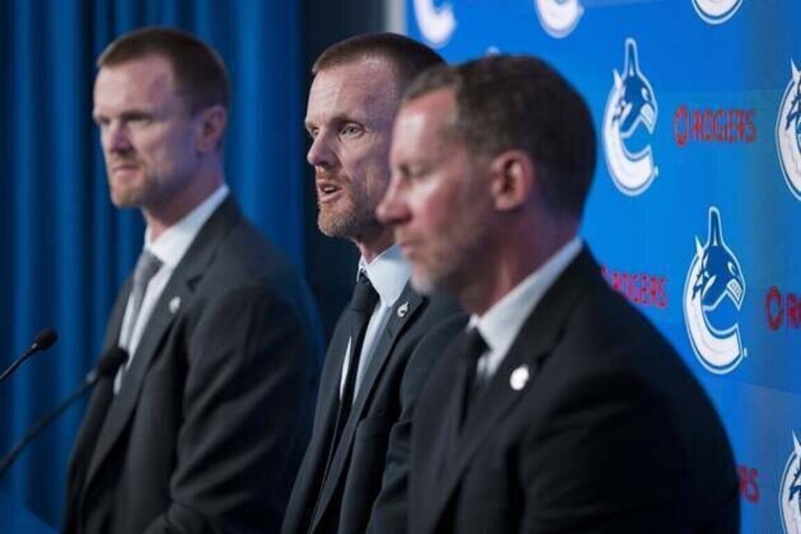 Canucks promote Ryan Johnson to GM, Sedin brothers to co-presidents