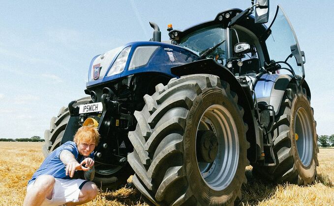 "Suffolk and Ipswich have always made me feel part of a community and protected." Ed Sheeran filmed the announcement video for his minority stake purchase of Ipswich Town while at Kiln Farm Nursery. He drove the New Holland T7 Blue Power tractor, as seen in the picture, emblazoned with the club's crest and colours. (Ed Sheeran)