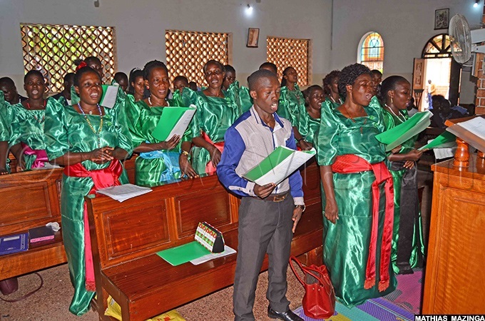  he choir of t ude haddeus atholic hrine aggulu in action during mass