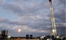 Service rig in operation during the successful Unit 1B workover.