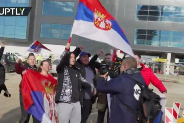 Crowds gather to greet deported Djokovic as he returns to Serbia