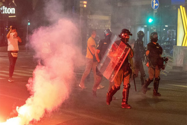 Serbia sees third night of mass protests as Vucic faces calls for early election