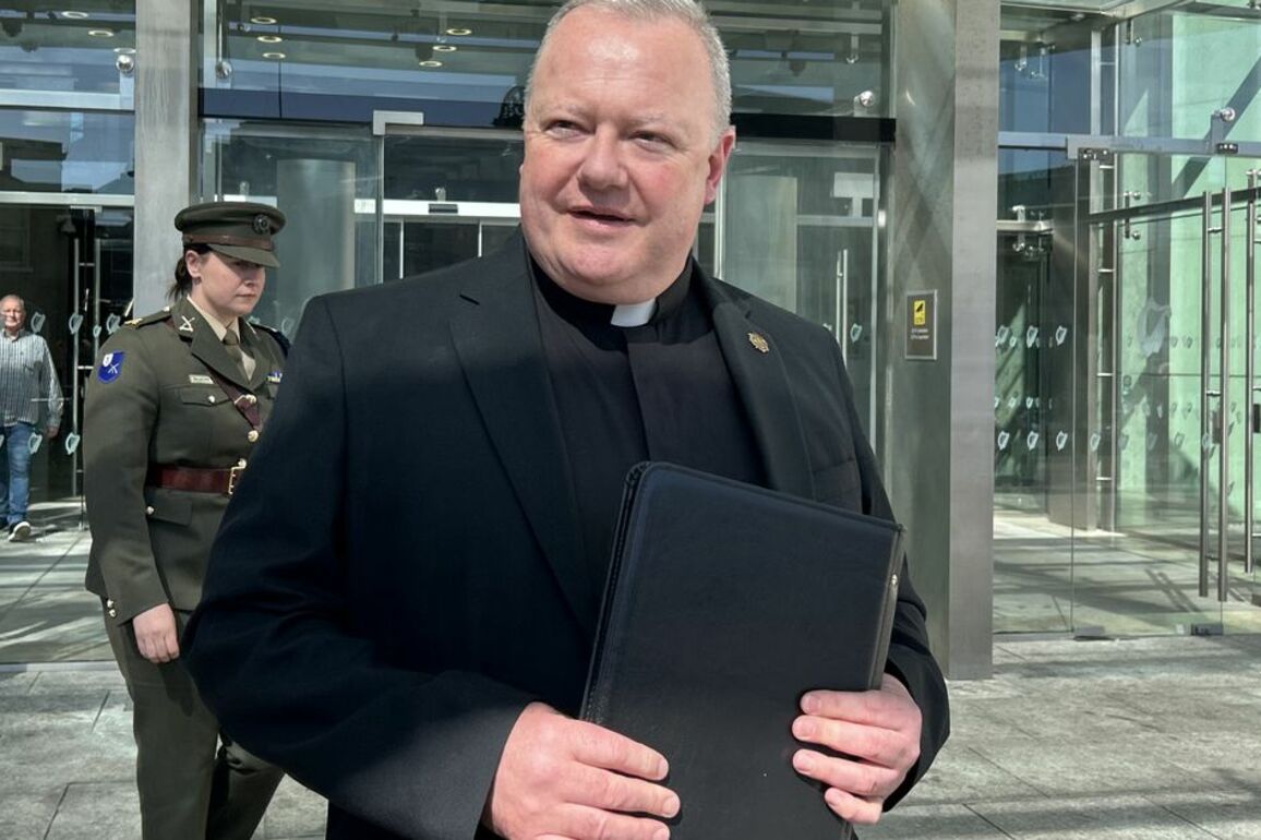 Irish Army chaplain hugs teen as he's sentenced for trying to kill him