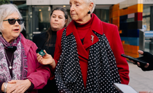 Friends of Australian Rock Art co-convenors Judith Hugo (L) and Susan Swain (R) talk to press outside Federal Court in Melbourne
