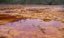Acid mine drainage (AMD) is a major environmental problem caused by the oxidation of sulfide minerals (like pyrite) exposed during mining activities