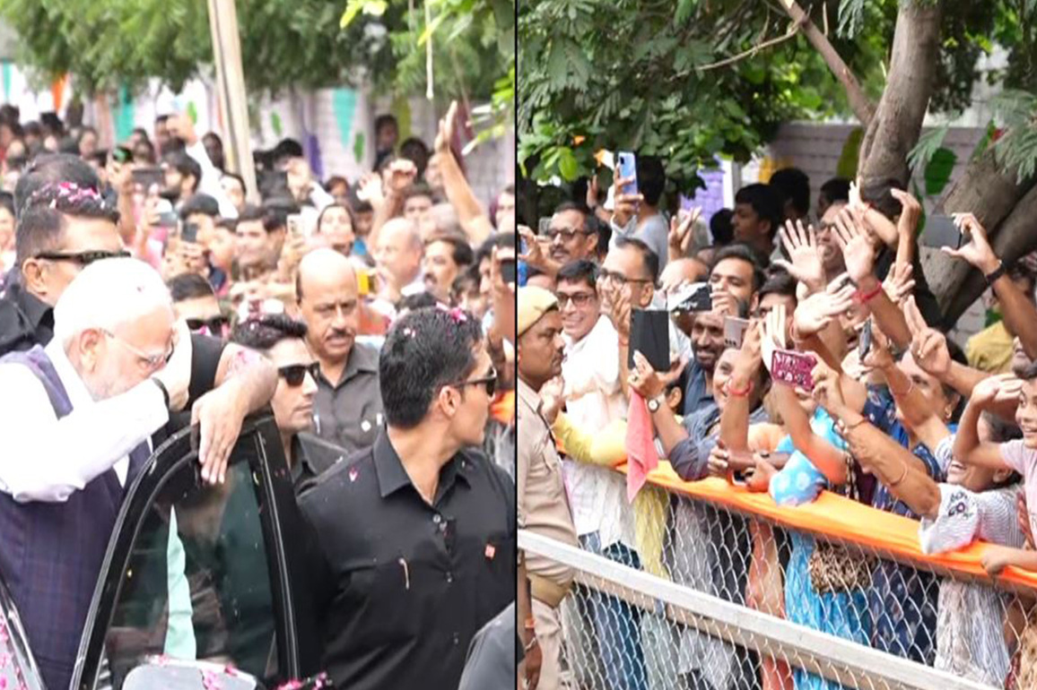 Gujarat: PM Modi responds to a child with a salute during Bhavnagar roadshow