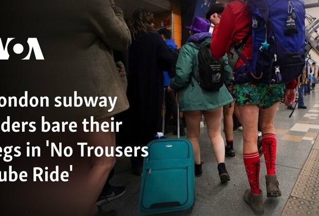 London subway riders bare their legs in &#039;No Trousers Tube Ride&#039;