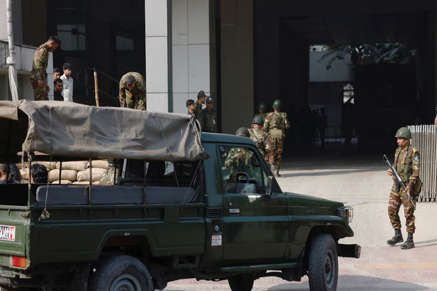 Bangladesh takes 15 serving and former army officers into military custody