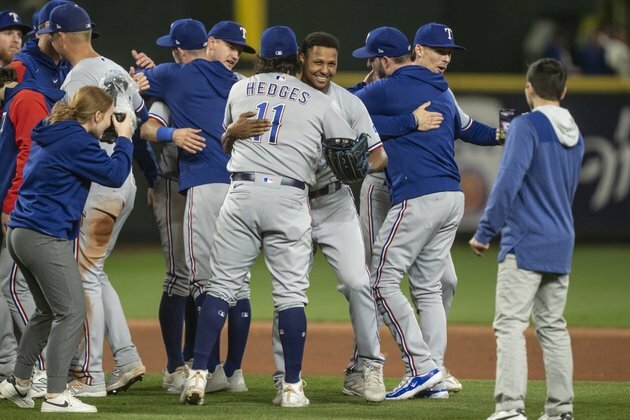 Rangers celebrate; Mariners mourn what could have been