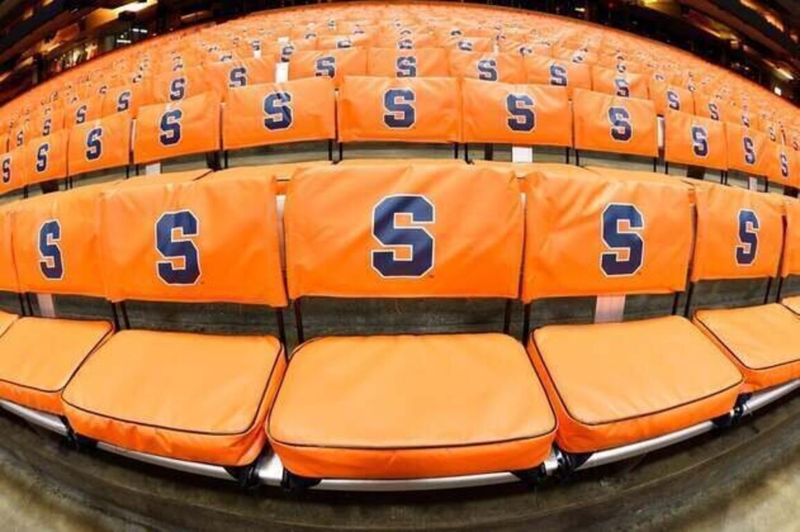 Celebrated Syracuse football signee Calvin Russell III to hoop, too