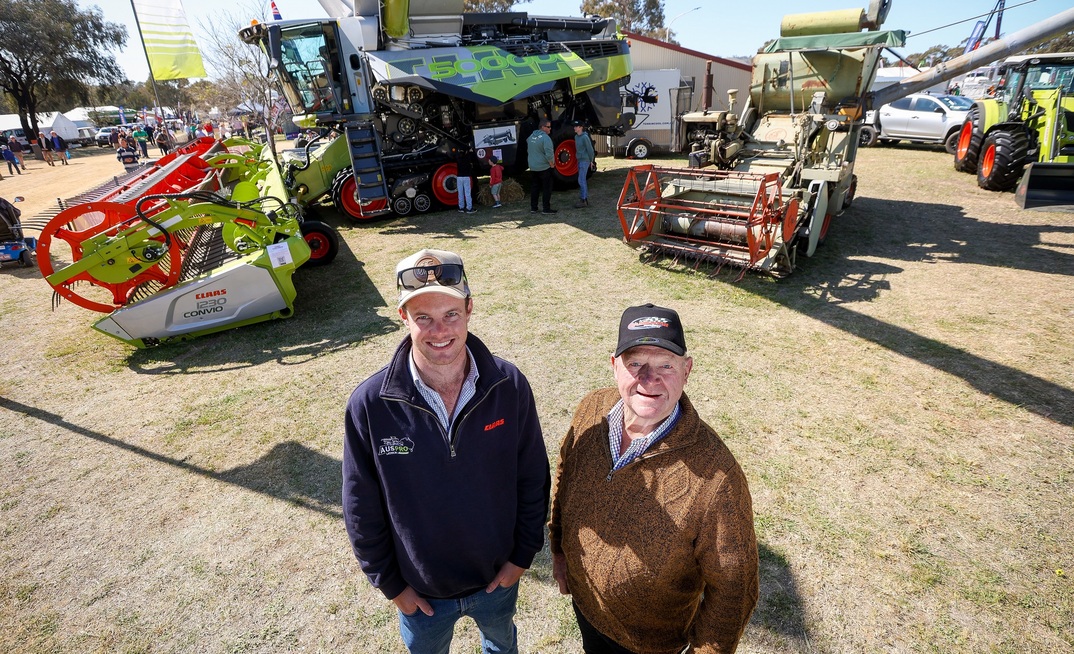 Jack Jordan-Hill, Lexion Landpower Group, with Bill Petzke, Corowa, NSW, owner of the vintage CLAAS Columbus header on display at Henty Machinery Field Days last week. Photo courtesy Henty Machinery Field Days. 