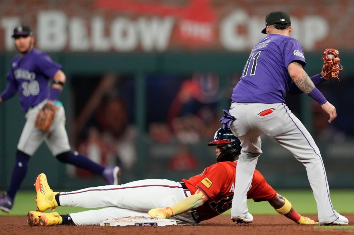 Rockies' bullpen implodes late in 12-4 loss to Braves as record slides to 13-56
