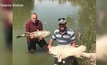  Rob McBride and Dick Arnold with some of the dead fish in the lower Darling River. Picture courtesy Tolarno Station/Facebook.