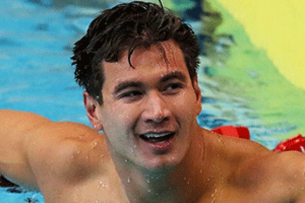 Olympic swimmer Adrian returns after cancer fight